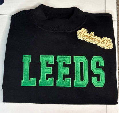 Leeds Satin Embroidery Mock-neck Sweatshirt