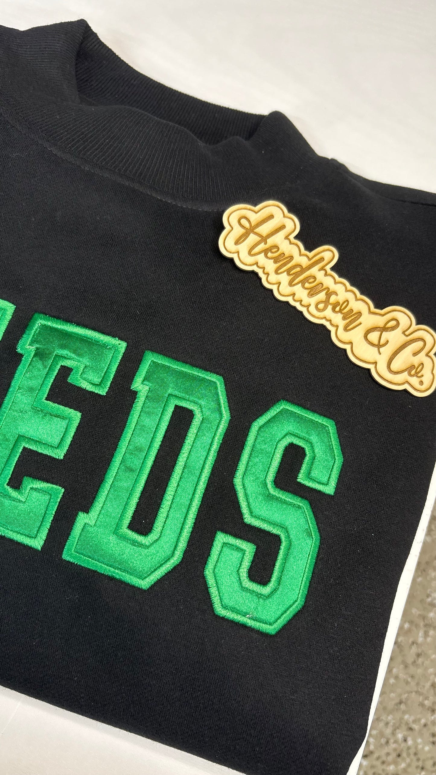 Leeds Satin Embroidery Mock-neck Sweatshirt